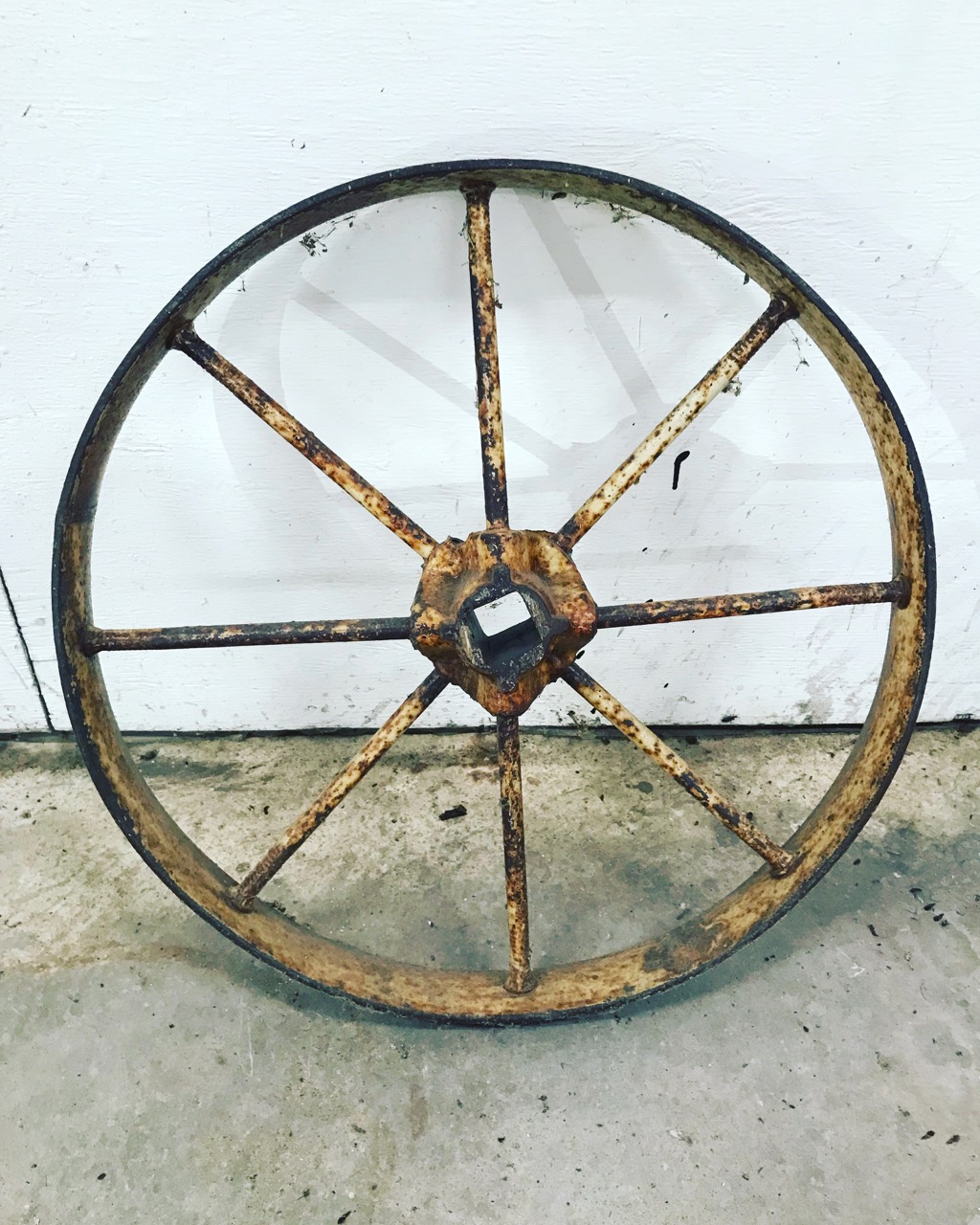 Big a** metal wagon wheel from way back