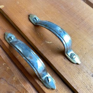 Vintage steel cabinet handle pair - handles and screws only.